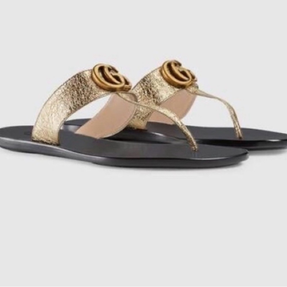 Gucci Gold Metallic Thong Sandals with Black Sole and Double-G